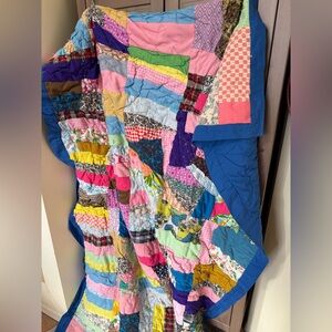 Handmade “scrappy” vintage multi pattern quilt 55x75